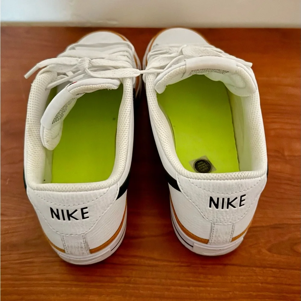 Nike White Sneakers with Black Swoosh and Gold Accent - Picture 6 of 7